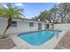 Relaxing rectangular pool with brick patio at 3553 Greenfield Ave, Orlando, FL 32808