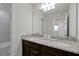Bathroom with double vanity and granite countertop at 866 Paradise Dr, Davenport, FL 33897
