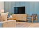 Living area with modern furniture and a stylish media console at 866 Paradise Dr, Davenport, FL 33897