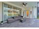 Covered patio with seating area and pool view at 866 Paradise Dr, Davenport, FL 33897