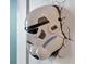 Star Wars themed helmet wall decor at 866 Paradise Dr, Davenport, FL 33897