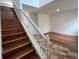 Elegant staircase leading to upper level at 9026 Paolos Pl, Kissimmee, FL 34747