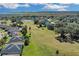 House nestled on golf course community, near pond at 1965 Fairway Loop, Kissimmee, FL 34746