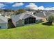 Aerial view of house showcasing large backyard at 1965 Fairway Loop, Kissimmee, FL 34746