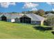 Aerial view of house showcasing large backyard at 1965 Fairway Loop, Kissimmee, FL 34746