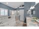Elegant bathroom featuring a large soaking tub and double vanity at 1965 Fairway Loop, Kissimmee, FL 34746