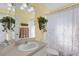 Clean bathroom with shower/tub combo and updated vanity at 1965 Fairway Loop, Kissimmee, FL 34746