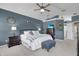 Spacious main bedroom with king-size bed, nightstands, and a dresser at 1965 Fairway Loop, Kissimmee, FL 34746