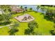 Community playground with playset, slides and benches at 1965 Fairway Loop, Kissimmee, FL 34746