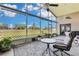 Spacious screened porch overlooking a golf course at 1965 Fairway Loop, Kissimmee, FL 34746