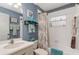 Charming bathroom with flamingo-themed decor and bathtub at 27000 Nature View St, Leesburg, FL 34748