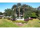 Community entrance sign with landscaping at 27000 Nature View St, Leesburg, FL 34748