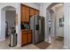 Kitchen with stainless steel refrigerator and coffee bar at 27000 Nature View St, Leesburg, FL 34748