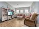 Relaxing living room with built-in shelving and comfortable seating at 27000 Nature View St, Leesburg, FL 34748