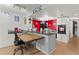 Galley kitchen with red walls and modern appliances at 2743 N Poinciana Blvd # 59, Kissimmee, FL 34746