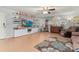 Spacious living room with large TV and ample seating at 2743 N Poinciana Blvd # 59, Kissimmee, FL 34746