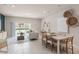Light and airy dining room with a table, chairs and access to the backyard at 3145 Emerald Acres Ln, Sanford, FL 32771