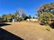 Large backyard with grassy area and storage shed at 412 Clemson Dr, Altamonte Springs, FL 32714