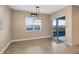 Bright breakfast nook with view and sliding glass door to patio at 4363 Summer Breeze Way, Kissimmee, FL 34744