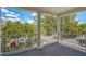 Private balcony overlooking the tree-lined street and parking at 4685 Anson Ln, Orlando, FL 32814
