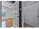 Bathroom with shower, toilet and wood-look tile floor at 4685 Anson Ln, Orlando, FL 32814