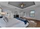 Bright main bedroom with hardwood floors and access to bathroom at 4685 Anson Ln, Orlando, FL 32814