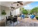 Outdoor patio with seating area and lush landscaping at 4685 Anson Ln, Orlando, FL 32814