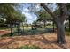 Modern playground with swings and play structures at 4685 Anson Ln, Orlando, FL 32814