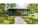 Community gazebo with picnic tables and restroom facilities at 5156 Tarragona Dr, Orlando, FL 32837