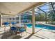 Relaxing screened pool area with patio furniture at 5156 Tarragona Dr, Orlando, FL 32837