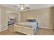 Bedroom with queen bed, nightstand and mirrored closet at 696 Youngstown Pkwy # 307, Altamonte Springs, FL 32714