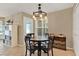 Dining area with round table and chairs, near a sliding door at 696 Youngstown Pkwy # 307, Altamonte Springs, FL 32714