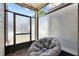 Private patio with comfy chair and frosted glass panels at 696 Youngstown Pkwy # 307, Altamonte Springs, FL 32714