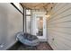 Cozy patio with round chair and access to the backyard at 696 Youngstown Pkwy # 307, Altamonte Springs, FL 32714