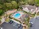 Aerial view of a community pool, hot tub, and lounge area at 696 Youngstown Pkwy # 307, Altamonte Springs, FL 32714