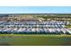 Aerial view of the home and surrounding neighborhood at 7212 Oakmoss Loop, Davenport, FL 33837