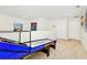 Fun game room with skee-ball and artwork at 7212 Oakmoss Loop, Davenport, FL 33837