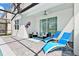 Relaxing poolside patio with lounge chairs at 7212 Oakmoss Loop, Davenport, FL 33837