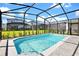 Private screened pool with spacious patio at 7212 Oakmoss Loop, Davenport, FL 33837