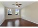 Bright bedroom featuring hardwood floors and neutral walls at 850 Caneel Bay Ter, Winter Springs, FL 32708