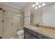 Bathroom with shower, toilet and granite vanity at 12023 Gold Creek Trl, Windermere, FL 34786