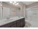 Bathroom with double vanity, tub and shower at 12023 Gold Creek Trl, Windermere, FL 34786