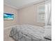 Bedroom with large bed and window shutters at 12023 Gold Creek Trl, Windermere, FL 34786