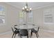 Casual breakfast nook with round table and modern chairs, perfect for everyday meals at 12023 Gold Creek Trl, Windermere, FL 34786