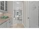 Butlers pantry offers additional storage and views into the dining room at 12023 Gold Creek Trl, Windermere, FL 34786