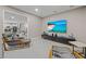 Relaxing home theater with comfortable seating and large screen at 12023 Gold Creek Trl, Windermere, FL 34786