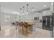 Modern kitchen with granite countertops and stainless steel appliances at 12023 Gold Creek Trl, Windermere, FL 34786
