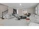 Spacious living room with contemporary furniture and large windows at 12023 Gold Creek Trl, Windermere, FL 34786