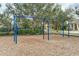 Community playground with swings and play area at 12023 Gold Creek Trl, Windermere, FL 34786