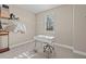 Bright walk-in closet with built-in shelving and workspace at 12023 Gold Creek Trl, Windermere, FL 34786